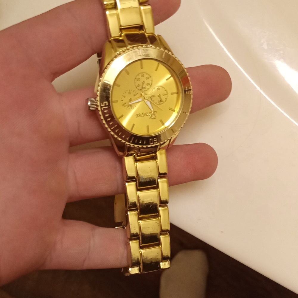 Geneva gold watch